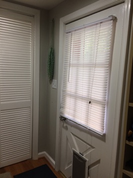 Once inside, there is a closet for coats and outdoor patio needs behind louvered doors Once inside, there is a closet for coats and outdoor patio needs behind louvered doors